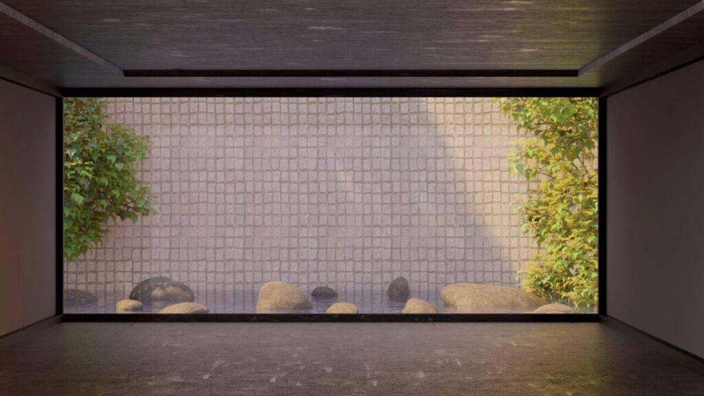 池と石が置かれた和モダンの中庭写真